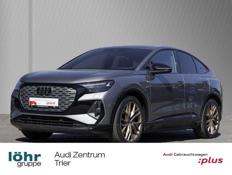 Taifungrau metallic Gebraucht 2022 Audi Q4 Sportback e-tron Ambiente SUV | 33.960 € (Guter Preis) - Bild 1/4