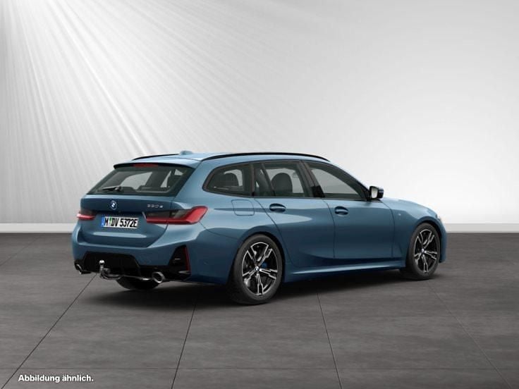 Gebraucht BMW 330e M Sport 292 PS (214 kW) 2024 Arctic race blue metallic Kombi