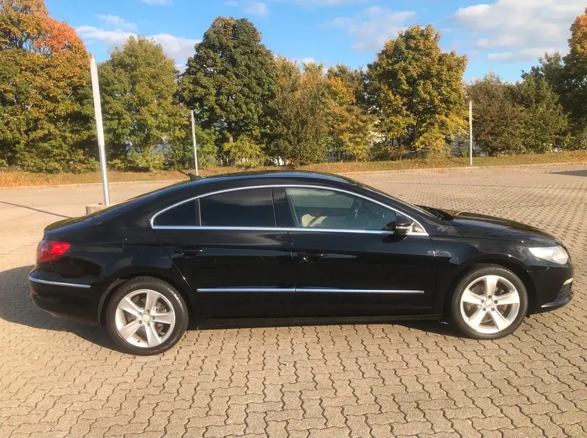 Second-hand VW Passat 160 CP (117 kW) 2010 Negru Berlinǎ