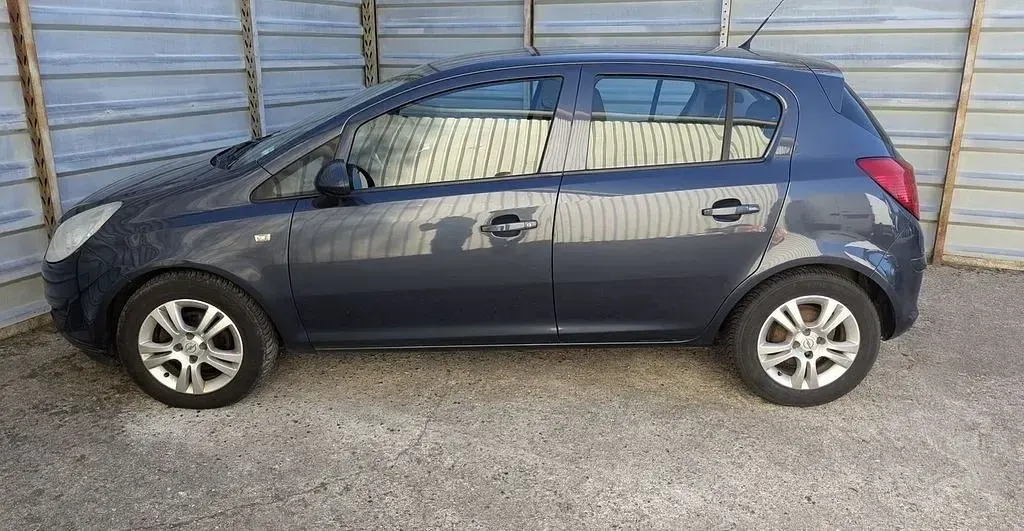 Usado Opel Corsa Catch Me 75 HP (55 kW) 2008 Cinzento Citadino