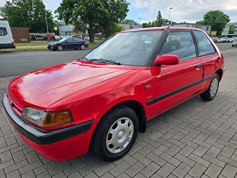 Gebraucht Mazda 323 88 PS (64 kW) 1993 Rot Limousine