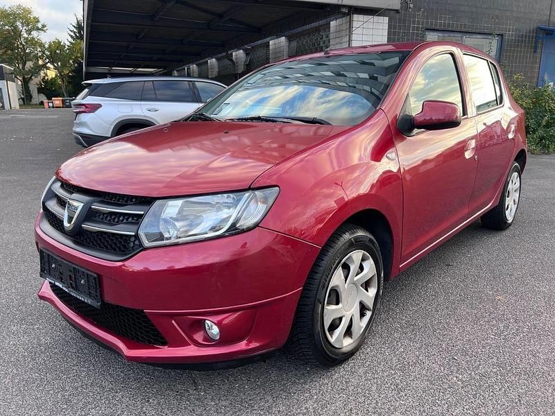 Rot Gebraucht 2014 Dacia Sandero Kleinwagen | 3.999 € (Superpreis) - Bild 1/4
