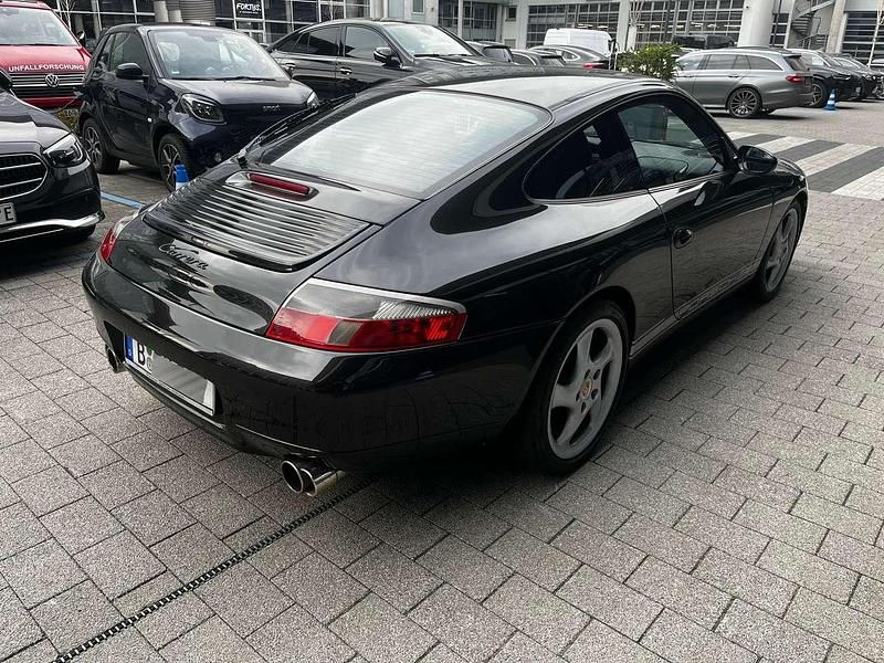 Gebraucht Porsche 911 Carrera 300 PS (220 kW) 2000 Schwarzmetallic Coupé