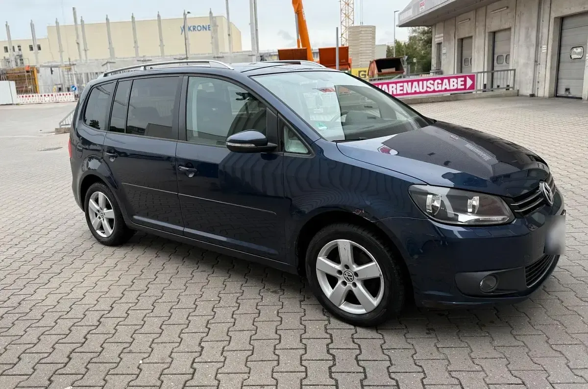 Używany VW Touran 105 KM (77 kW) 2011 Niebieski Minivan