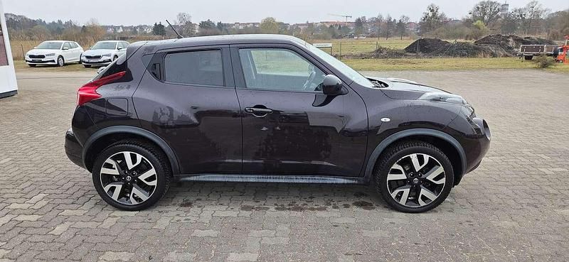 Gebraucht Nissan Juke Acenta 117 PS (86 kW) 2014 Violett/schwarz SUV