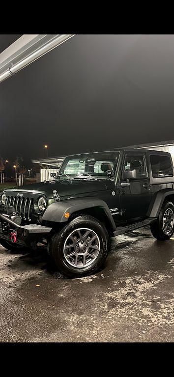 Grün Gebraucht 2012 Jeep Wrangler Sport SUV | 20.500 € (Teuer) - Bild 1/4