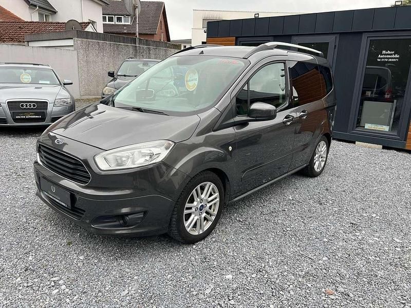Gebraucht Ford Tourneo Courier Titanium 101 PS (74 kW) 2015 Magneticgrau (metallic) Van / Kleinbus