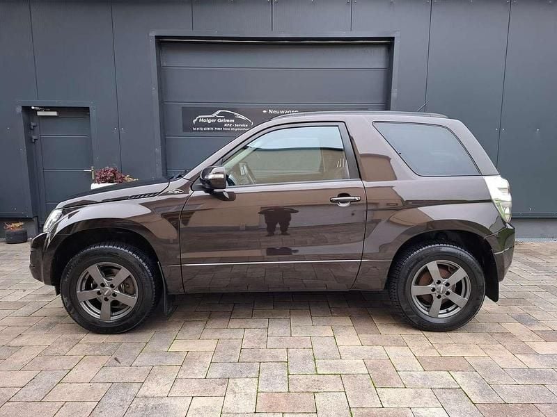 Braun Gebraucht 2015 Suzuki Grand Vitara SUV | 12.990 € - Bild 1/4