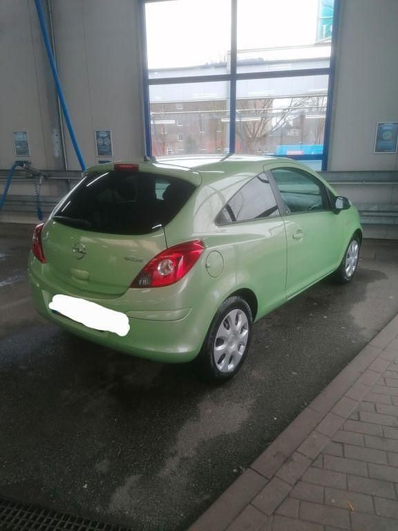 Gebraucht Opel Corsa Selection 69 PS (50 kW) 2010 Grün Kleinwagen