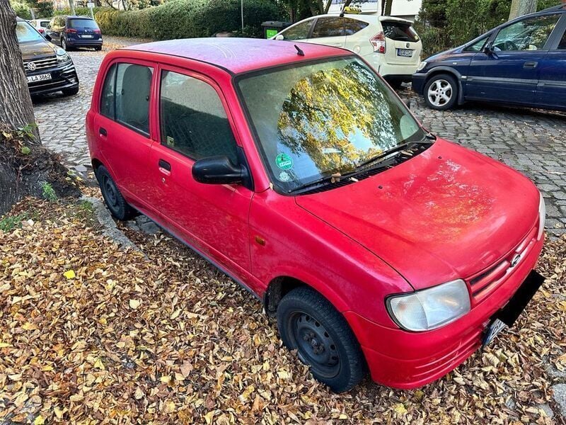 Gebraucht Daihatsu Cuore 56 PS (41 kW) 1999 Rot Kleinwagen
