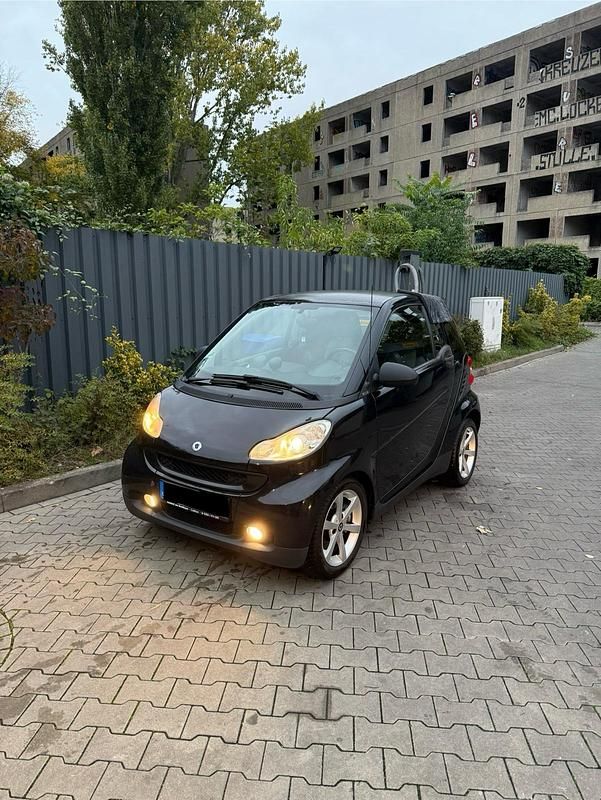 Schwarz Gebraucht 2010 Smart ForTwo Coupé Pulse Kleinwagen | 3.990 € - Bild 1/4