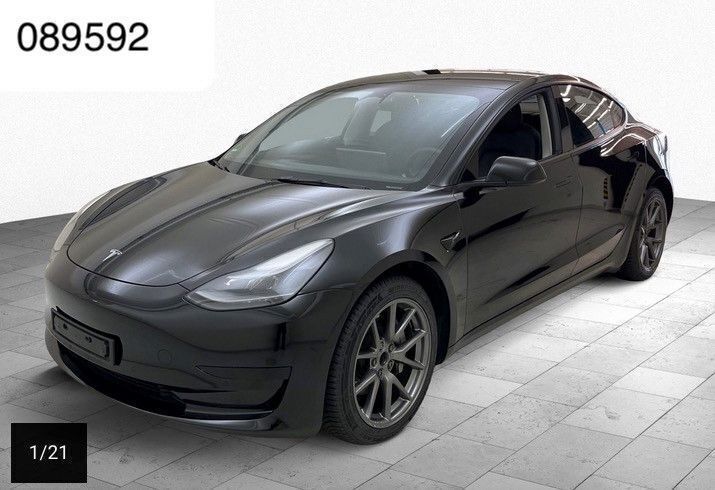 Black metallic Gebraucht 2022 Tesla Model 3 Standard Range Limousine | 25.950 € (Superpreis) - Bild 1/4