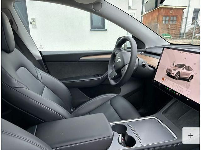 Gebraucht Tesla Model Y Long Range AWD 378 kW (514 PS) 2023 Sonderlackierung perlweiß SUV