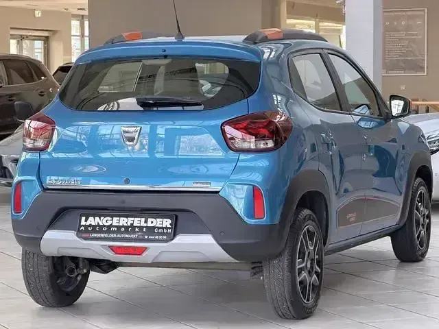 Gebraucht Dacia Spring Comfort Plus 50 kW (68 PS) 2022 Morgenbrisenblau Kleinwagen