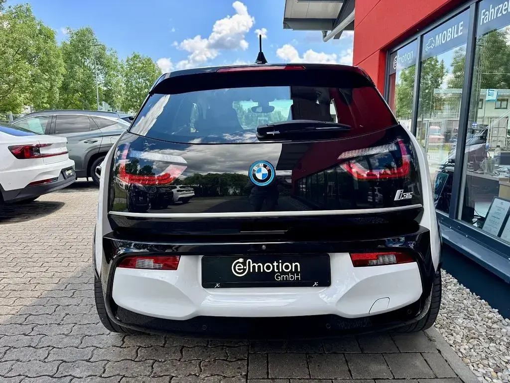 Gebraucht BMW i3 135 kW (184 PS) 2022 Capparisweiß mit bmw i blau Kleinwagen