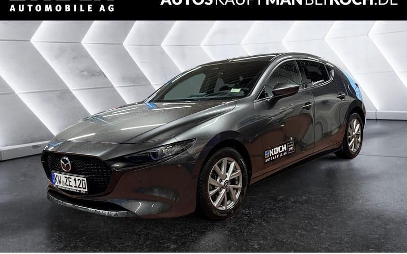 Machine grey metallic Gebraucht 2024 Mazda 3 Exclusive-Line Limousine | 28.880 € (Fairer Preis) - Bild 1/4