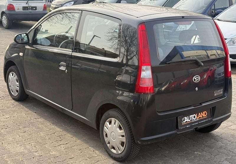 Gebraucht Daihatsu Cuore 58 PS (42 kW) 2006 Schwarz Kleinwagen