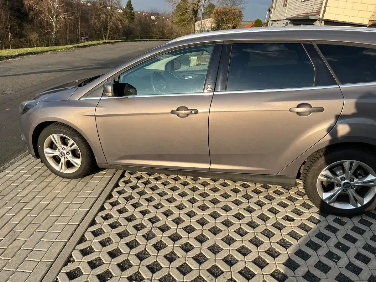 Używany Ford Focus 125 KM (91 kW) 2012 Szary Kombi