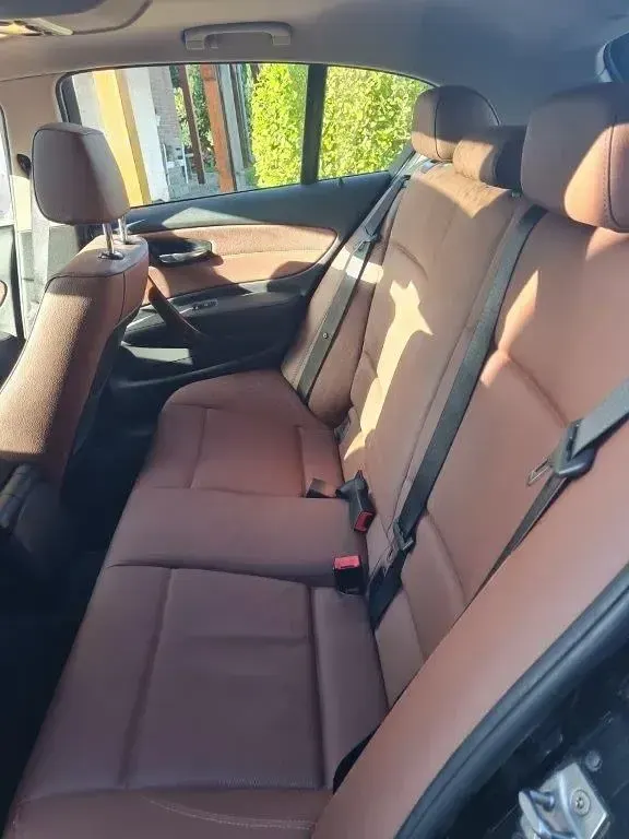 Second-hand BMW 120 177 CP (130 kW) 2010 Negru Hatchback