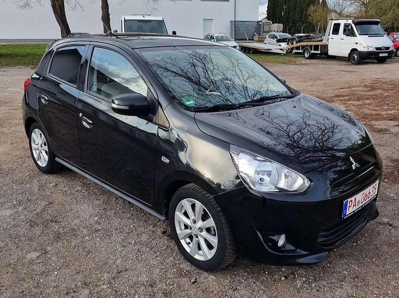 Second-hand Mitsubishi Space Star Top 80 CP (58 kW) 2014 Negru Hatchback