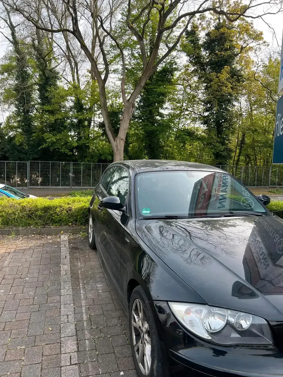 Gebraucht BMW 116 122 PS (89 kW) 2010 Schwarz Kleinwagen