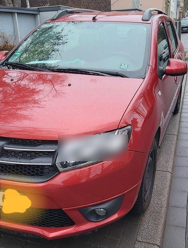 Rot Gebraucht 2014 Dacia Logan MCV Lauréate Kombi | 3.999 € (Fairer Preis) - Bild 1/4