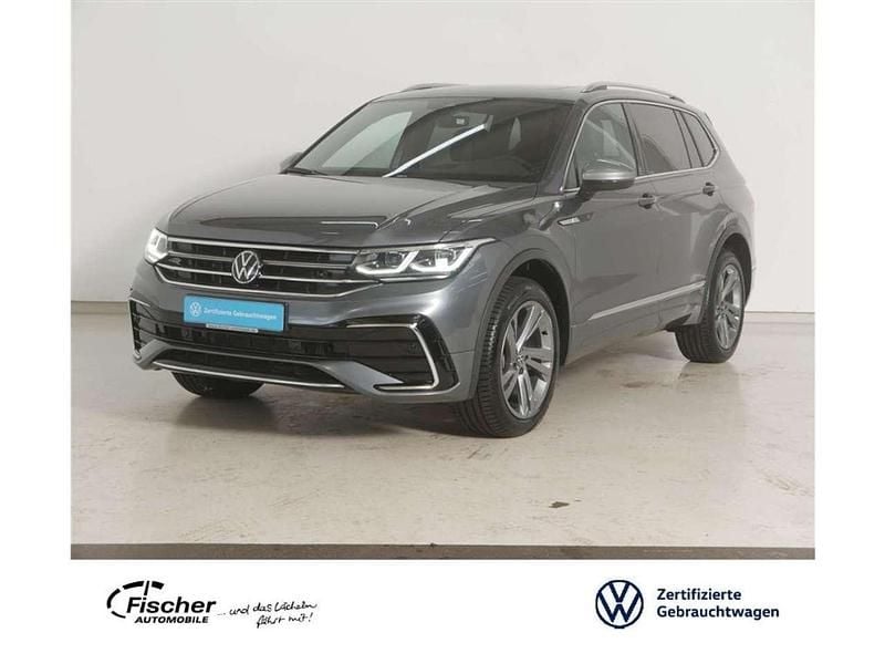 Grau Gebraucht 2024 VW Tiguan Allspace R-line SUV | 47.940 € (Etwas zu teuer) - Bild 1/3