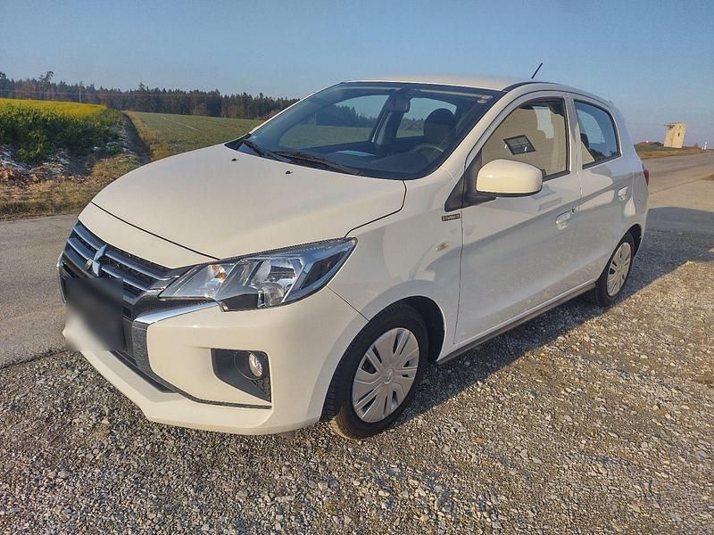 Weiß Gebraucht 2024 Mitsubishi Space Star Select Kleinwagen | 12.550 € (Fairer Preis) - Bild 1/4