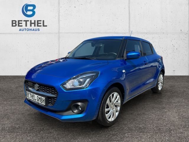 Speedy blue metallic (zwg) Gebraucht 2020 Suzuki Swift Comfort Limousine | 11.990 € (Fairer Preis) - Bild 1/4