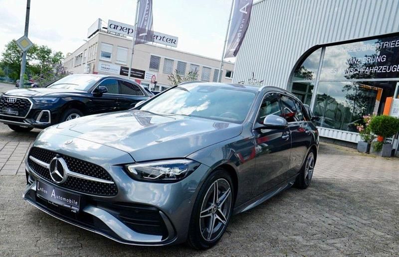 Grau Gebraucht 2022 Mercedes C220 AMG line Limousine | 34.800 € (Teuer) - Bild 1/4
