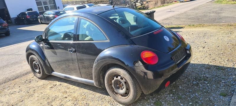 Gebraucht VW New Beetle 75 PS (55 kW) 2002 Schwarz Kleinwagen