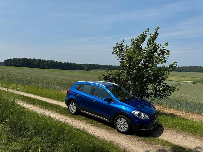 Blau Gebraucht 2013 Suzuki SX4 SUV | 7.500 € (Fairer Preis) - Bild 1/4