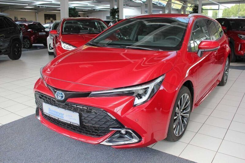 Karminarot metallic Neu 2024 Toyota Corolla Team Kombi | 29.750 € - Bild 1/4