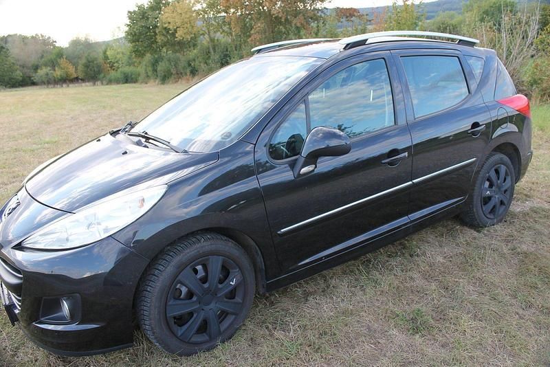Silber Gebraucht 2011 Peugeot 207 Kombi | 3.999 € (Fairer Preis) - Bild 1/4