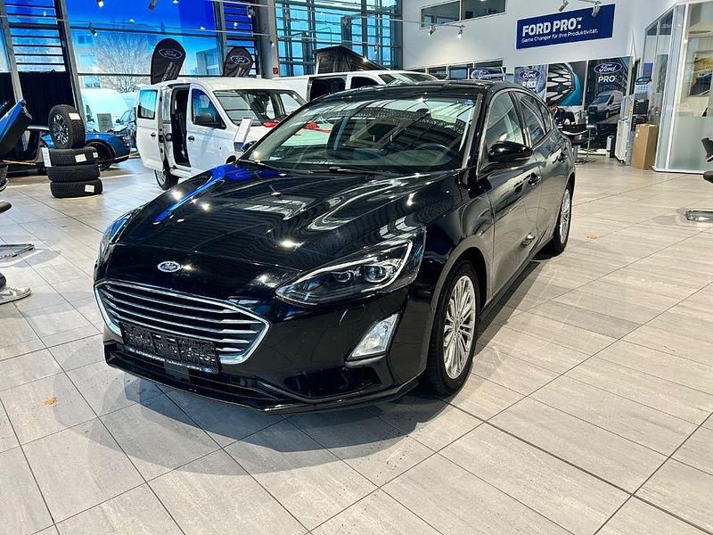 Gebraucht Ford Focus Titanium 125 PS (91 kW) 2019 Iridiumschwarz metallic Limousine