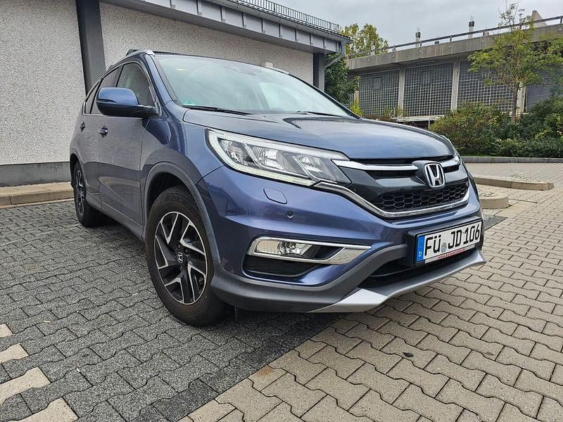 Blau Gebraucht 2017 Honda CR-V Elegance SUV | 20.860 € (Etwas zu teuer) - Bild 1/4