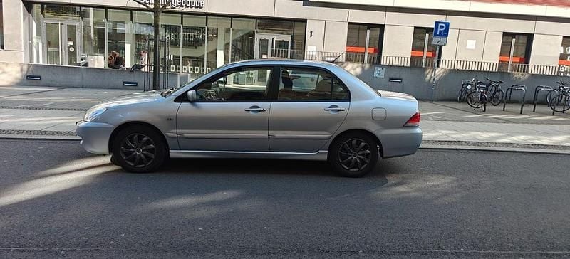 Gebraucht Mitsubishi Lancer Invite 98 PS (72 kW) 2005 Silber Kombi