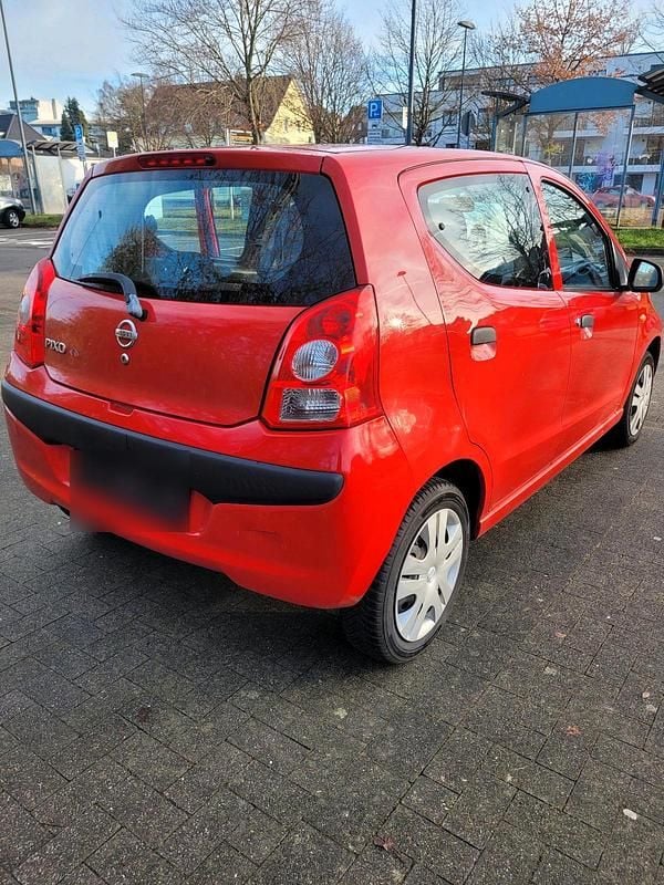 Gebraucht Nissan Pixo 68 PS (50 kW) 2009 Rot Kleinwagen