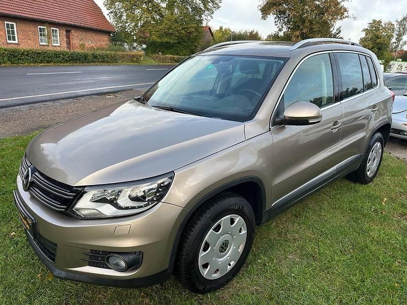 Beige Gebraucht 2012 VW Tiguan Sportline SUV | 11.749 € (Fairer Preis) - Bild 1/4
