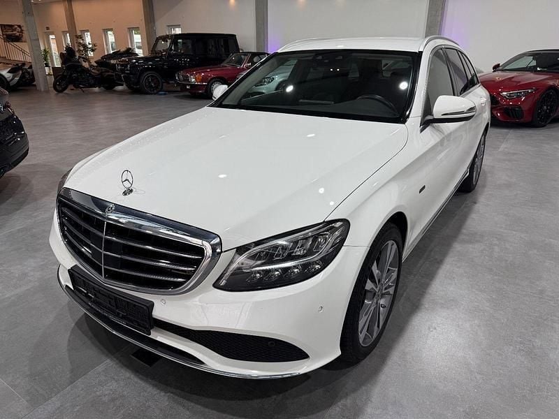 Weiß Gebraucht 2021 Mercedes C300e Kombi | 22.750 € (Fairer Preis) - Bild 1/4