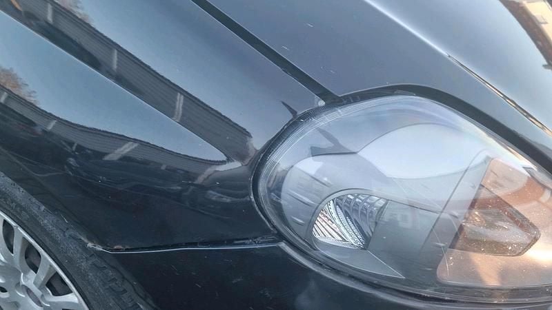 Gebraucht Fiat Grande Punto 74 PS (54 kW) 2012 Schwarz Kleinwagen