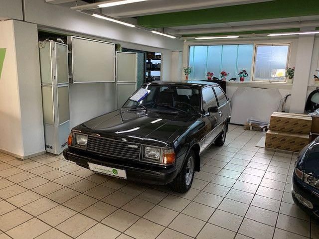 Schwarz Gebraucht 1980 Mazda 323 Kleinwagen | 10.980 € - Bild 1/4