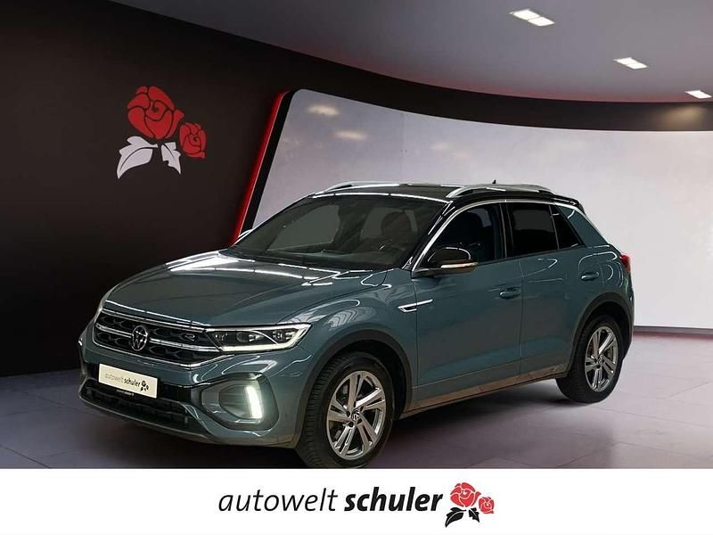 Petroleum blue (metallic) Gebraucht 2023 VW T-Roc R-line SUV | 27.480 € (Fairer Preis) - Bild 1/4
