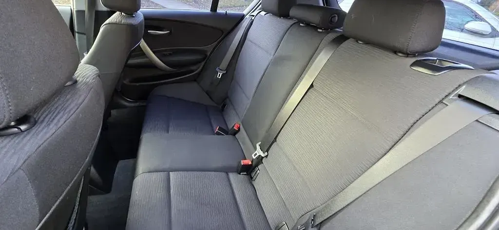 Gebraucht BMW 116 122 PS (89 kW) 2008 Schwarz Kleinwagen