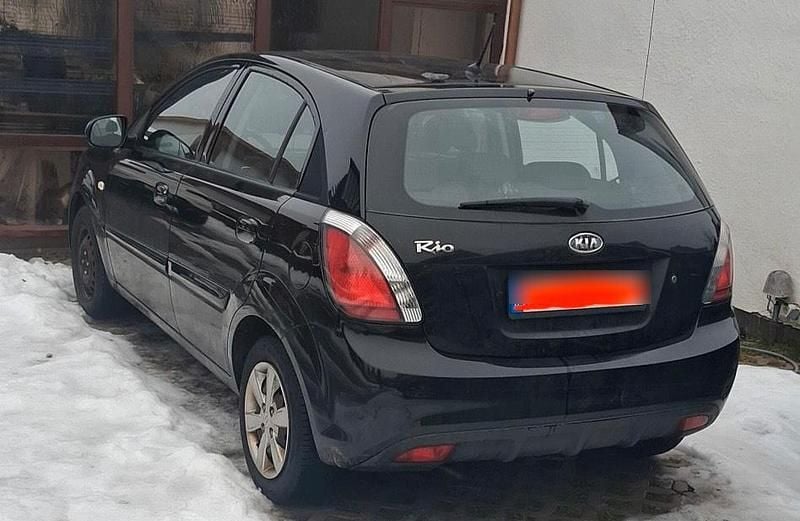 Gebraucht Kia Rio 96 PS (70 kW) 2010 Schwarz Kleinwagen