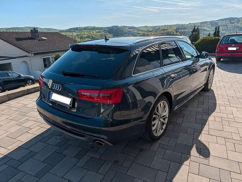 Second-hand Audi A6 Sport 245 CP (180 kW) 2013 Albastru Break