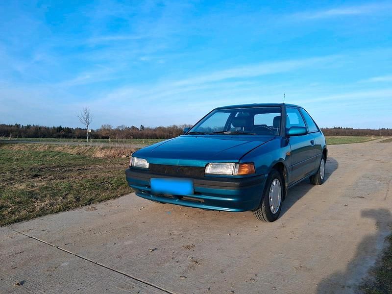 Gebraucht Mazda 323 73 PS (53 kW) 1993 Grün Kleinwagen