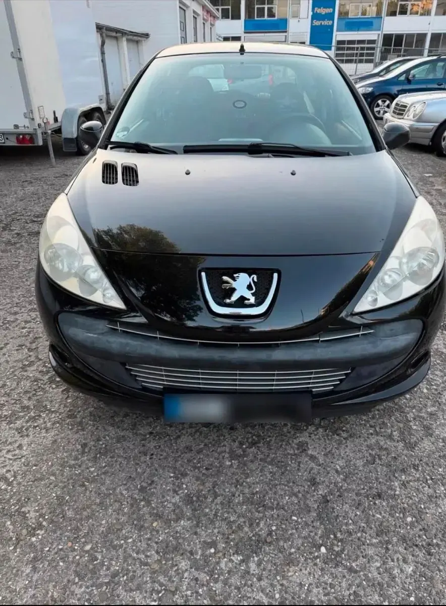 Gebraucht Peugeot 206+ 75 PS (55 kW) 2009 Schwarz Kleinwagen