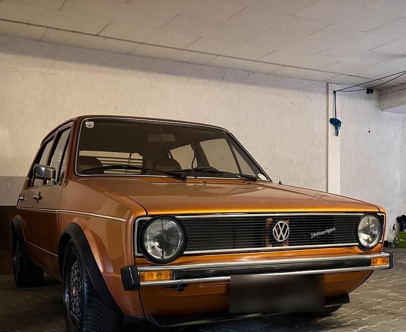 Second-hand VW Golf I GTI 75 CP (55 kW) 1976 Auriu Hatchback