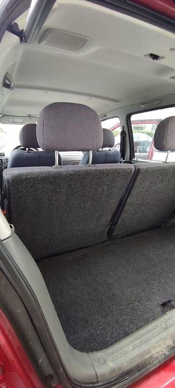 Second-hand Suzuki Wagon R+ 2002 Roșu Monovolum